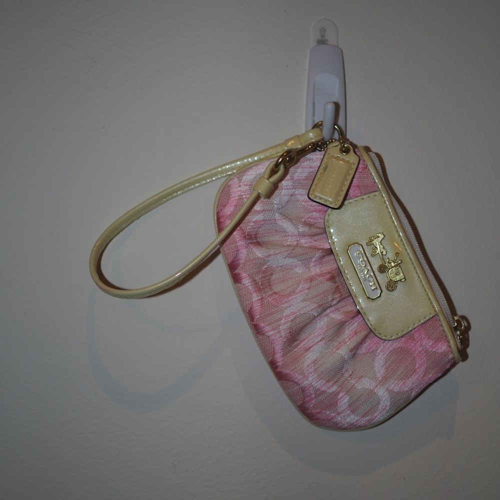 Small pink & white Coach wristlet/clutch.